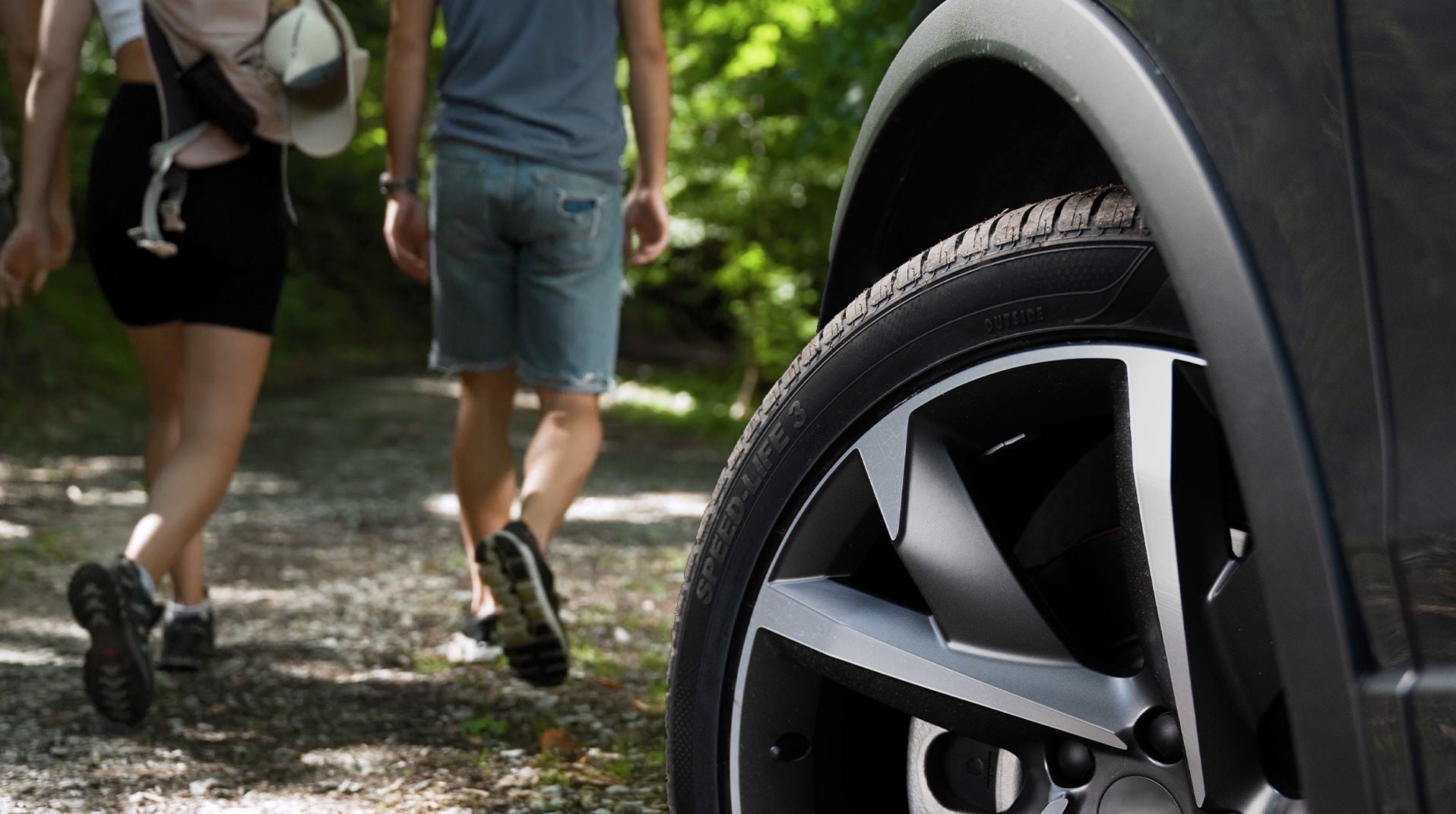 Couple-Forest-Walk in the Backround (tyre in foreground)