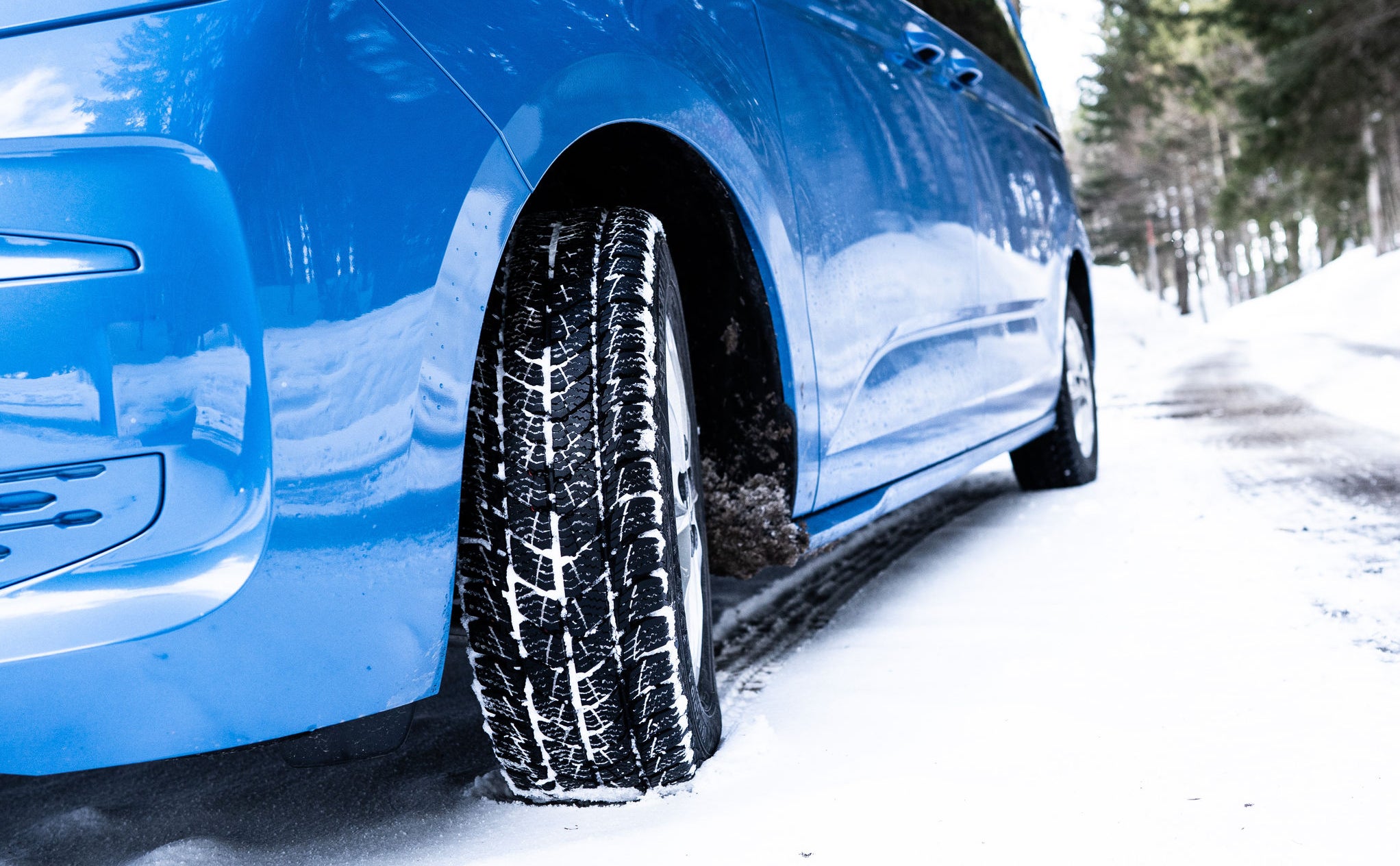 Blue Van in Snow